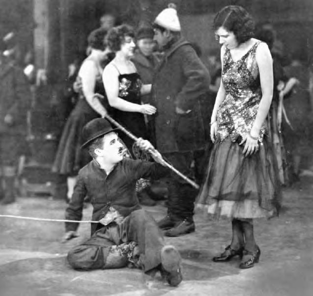 2 33a. The Gold Rush (U.S.A., 1925), with Charles Chaplin and Georgia Hale, directed by Chaplin. Both these scenes involve a fear of rejection by a woman Charlie holds in awe.