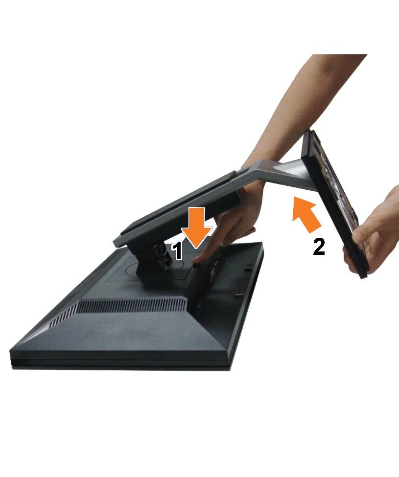 To remove the stand: 1. Rotate the stand to allow access to the stand release button. 2. Press and hold the Stand release button. 3. Lift the stand up and away from the monitor.