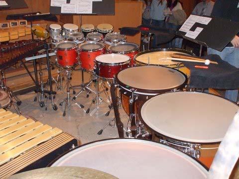 Since the instruments create a ring around the performer, music must be placed in various locations among the instruments.