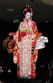 customers, and the audience to be intoxicated with performance and fine food. In the show, I tried Geisha Dressing for Akimbo while he read a Maiko (the daughter stage before becoming a Geisha) poem.