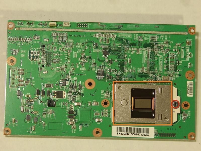 Step 11 Lay the board facedown on a smooth surface. Do not touch front of the dlp chip.