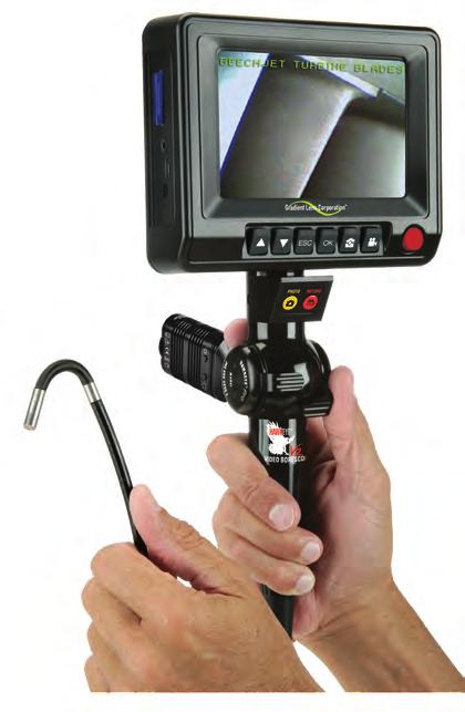 articulation thumb lever(s). Use the other hand to hold the insertion tube and guide it toward the inspection area.