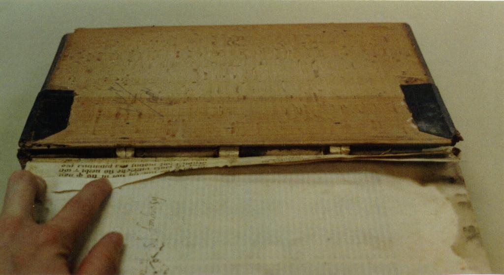 The Binding: The Epistole is a traditional raised band medieval book. There are three straps of leather across the spine that are attached to the wooden cover boards with glue and nails.