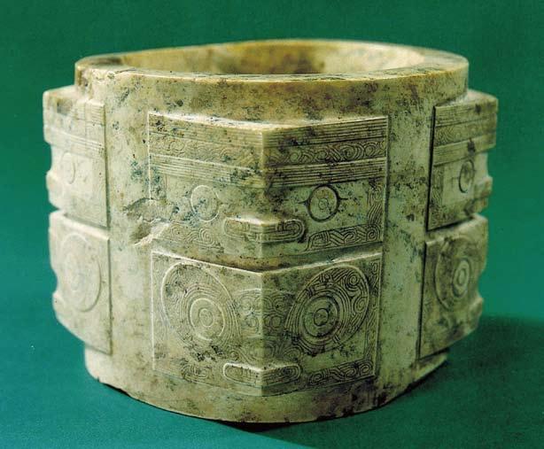 Beginnings of Chinese Sculpture Beast-face pattern Cong (a cubic article with a round hole in center), the Neolithic Age. jade were gradually combined with various shapes.