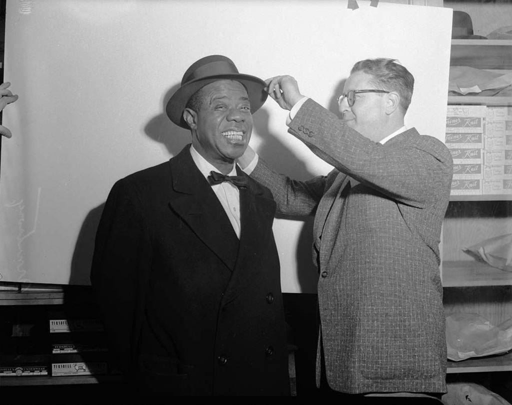 Louis Armstrong 4 Armstrong enjoyed working with Oliver, but Louis' second wife, pianist Lil Hardin Armstrong, urged him to seek more prominent billing and develop his newer style away from the
