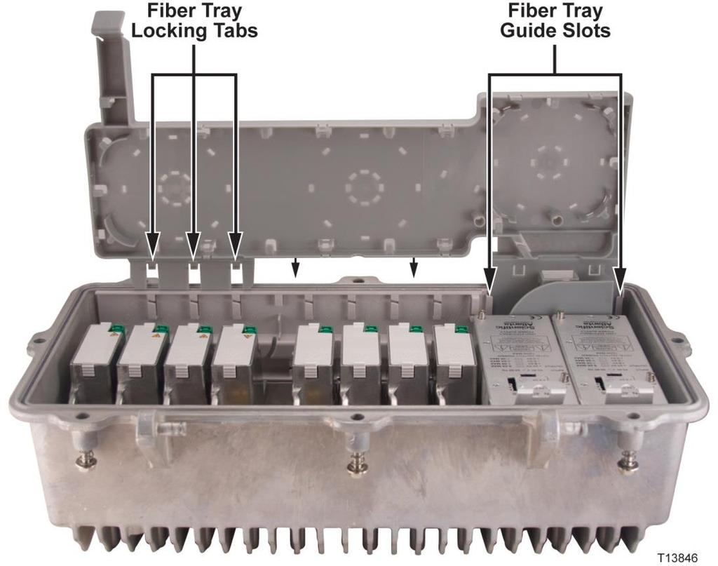 Expanded Fiber Tray Installation Important: Make sure that the fiber tray fits into the two guide slots in the fiber track near the power supplies.