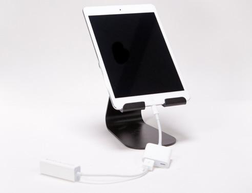 Place the ipad mini 2, found in the top layer of the kit, on the tablet stand. Be sure to remove the protective plastic from the ipad.