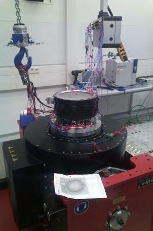 Figure 5. Photographs of RIT 2X EM thruster at Lampoldshausen vibration facility. parallel qualification with two qualification models (QM) was defined.