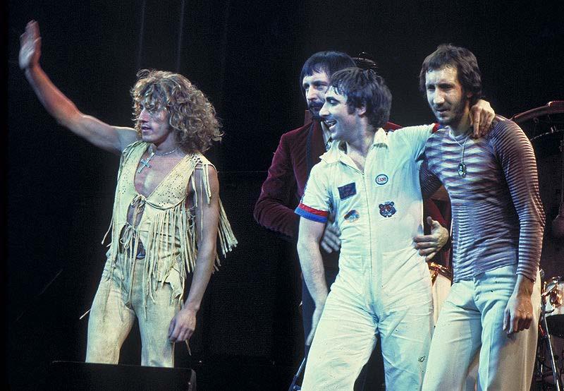 History Origins (1960s) The Who on stage in 1975 In the mid-1960s, American and in particular British rock bands began to modify rock and roll, adding to the standard genre greater blues influence,