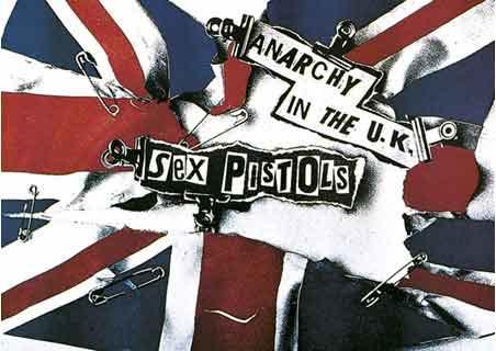 The Sex Pistols' "Anarchy in the U.K." poster a ripped and safety-pinned Union Flag In October, The Damned became the first UK punk rock band to release a single, the romance-themed "New Rose".