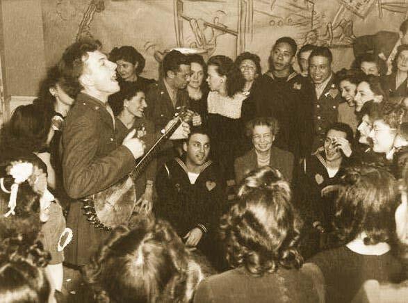 Antecedents The folk music revival Pete Seeger entertaining Eleanor Roosevelt (center), at a racially integrated Valentine's Day party In the United States, folk rock arose mainly from the confluence