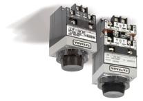 precise timing instrument which balances pneumatic, electrical, and mechanical forces using a minimum of moving parts.