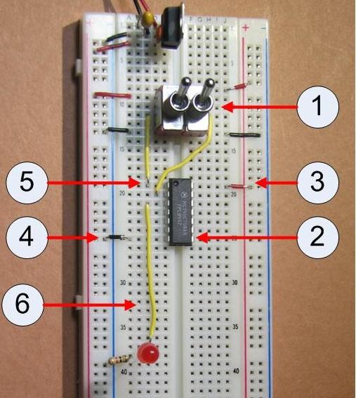 52 DIGITAL CIRCUIT PROJECTS 4. Ground the chip by connecting pin 7 to the ground rail. 5. Connect the input pins 1 and 2 to the inputs from the two switches. 6. Connect the output pin 3 to the LED.