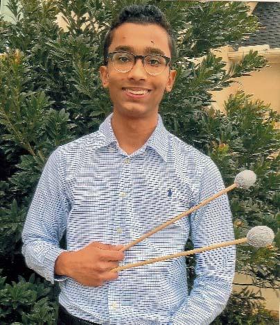 Senior Wind Division Nevin George (marimba) Co-Winner, Senior Wind Division, Concerto for Marimba and Strings, 2 nd mvt., by Sejourne. Age 17 and in the 11 th grade at Cinco Ranch High School.