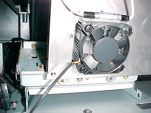 To access the screws securing the Light Engine, the Airduct and DMD Fan Cover must be removed from the rear of the set. Remove the 4 screws (c) shown in Figure 3-2 to remove the cover.