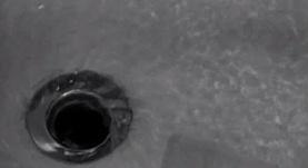 The shot of the omnipotent showerhead eye is repeated as it surveils the scene, while another reference to circles (as eyes) appears: The shot of