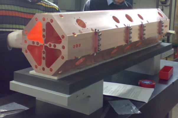 simulations and measurements performed on the aluminum model of the RFQ.