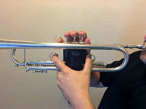 The back should be straight with shoulders relaxed. The trumpet should be brought up to the student s lips as opposed to the student bringing his head down to the trumpet.