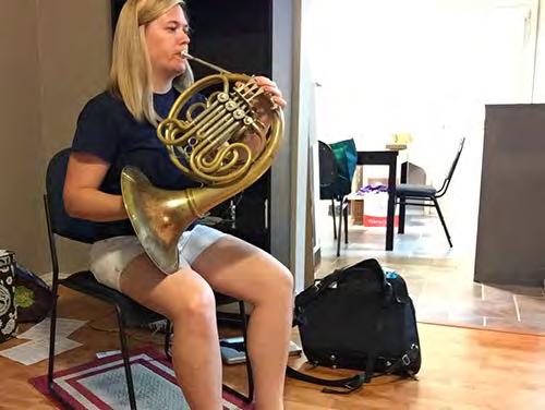 A large difference between trumpet and horn is that the head will stay up and straight as opposed to angling down with the horn.
