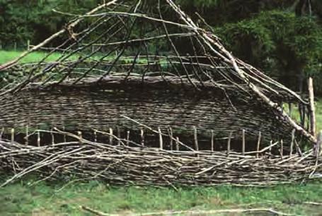 Brian Kearney Figure 2: A full size, partial reconstruction of a medieval roundhouse based on the basket-weaving techniques discovered at Deer Park Farms (From Lynn 2001: 128) be invited to listen to