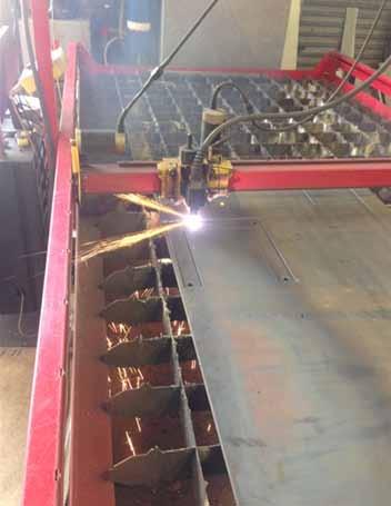 From there we simply upload the drawing file into the CNC Plasma System, convert it to a cut path, load the material on the bed and hit cut.