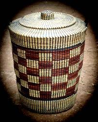 Design/P1 13 DBE/Feb. Mar. 2016 5.2 FIGURE B: Zulu Basket by RootzCreationz (South Africa), 2013. 5.2.1 Write a paragraph in which you discuss the importance of practising traditional craftwork.