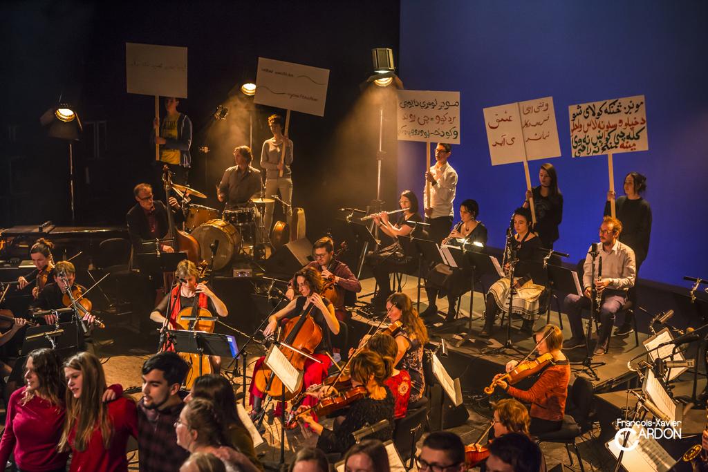 PRESS RELEASE Garrett List, Orchestra ViVo!, and 30 senior year high school students (Namur, Belgium) combine their energy of hope and fraternity to come together for peace.