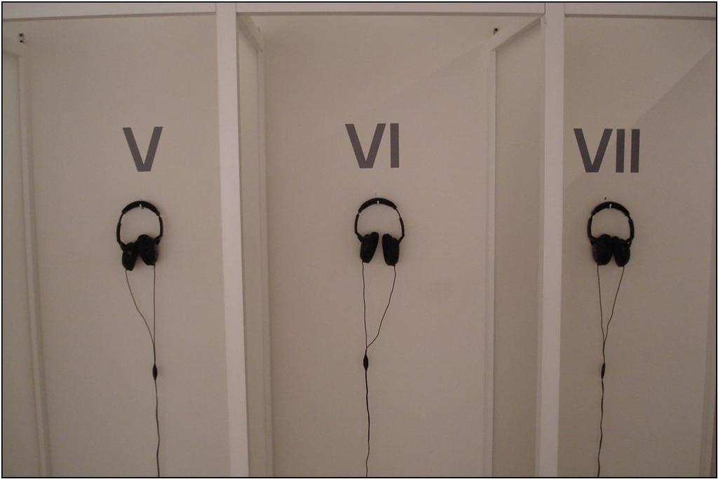 Figure 3. There were seven cabins with headphones secured on the nails. Visitors were expected to listen to PharmaCompositions after taking a pill.