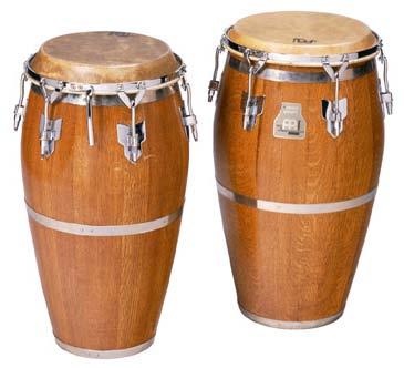 The talking drum, another kind of African drum, is shaped like an hourglass wide at the top and bottom, and narrow in the middle. Talking drums have a head at the top and bottom.