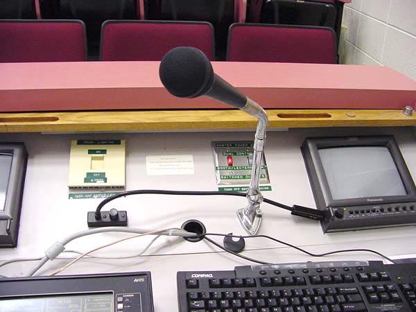 The sound can be made louder by moving the microphone closer to the source of sound, or by speaking louder into the microphone. The battery is in a compartment on the back of the transmitter.