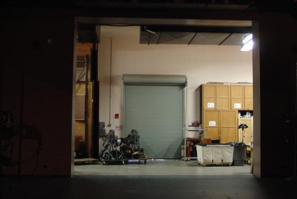 Pg 4 of 15 SHOP AREA: 10 x 40 storage space for cases Lighting racks and dance booms storage (1) 8 W x 10 H rolling doors from loading dock (1) 18 W x 17 H rolling door from shop to stage Floor is