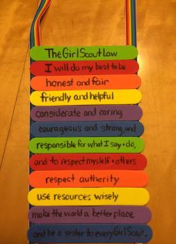 Craft Law wall hanger You ll need: coloured large craft sticks, ribbon, sharpies, glue gun Have the girls write down parts of the law on each popsicle stick.