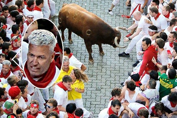 1c. That's Rex Ryan, the coach of the NFL's New York Jets, who ran with the bulls