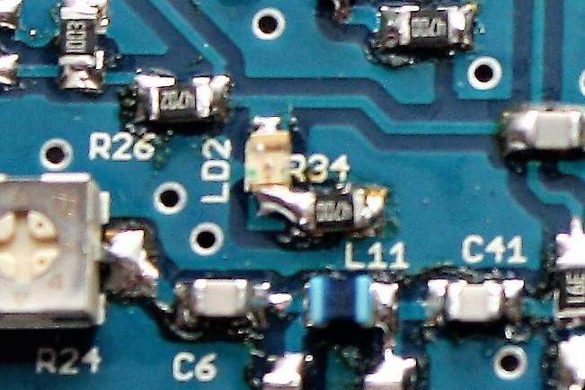 The amount of bare board showing, to be solder to, is very limited on this board. Use a small pointed soldering iron and ensure a good solder filet along the length of the filter. Photo G4FRE.