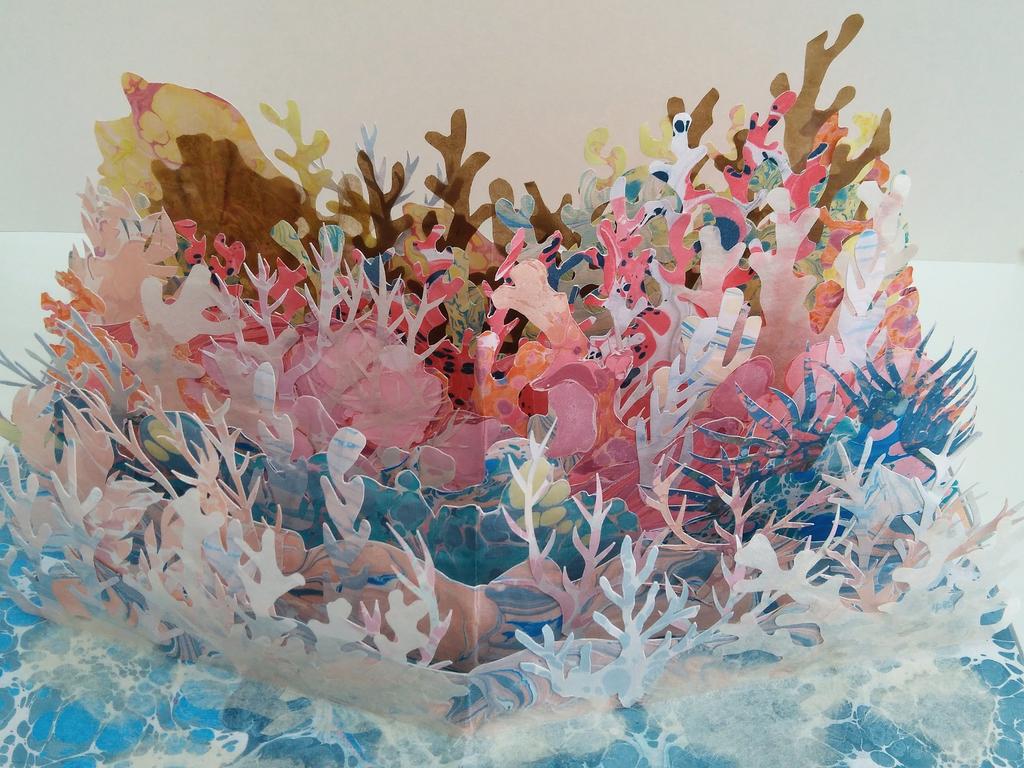 A Unique Pop-Up Environmentalist Statement 1. Busquets, Carla. Coral Reef. Barcelona: Carla Busquets, 2018. Unique. [264] $500. Single folio pop-up coral reef.