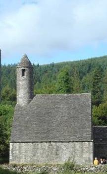 Kevin s Cross and its round tower We travel over the Wicklow Gap, viewing spectacular panoramic landscapes and the dramatic Turlogh waterfall Festival choir rehearsal with McGlynn