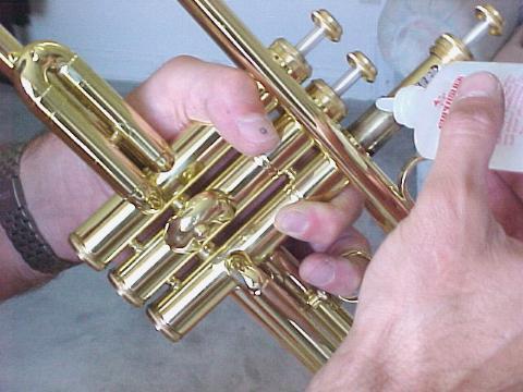 Cleaning and Maintenance OILING THE VALVES - do this about 2 times a week. Hold your trumpet exactly like would would when playing it but hold it at a 45 degree angle downward.