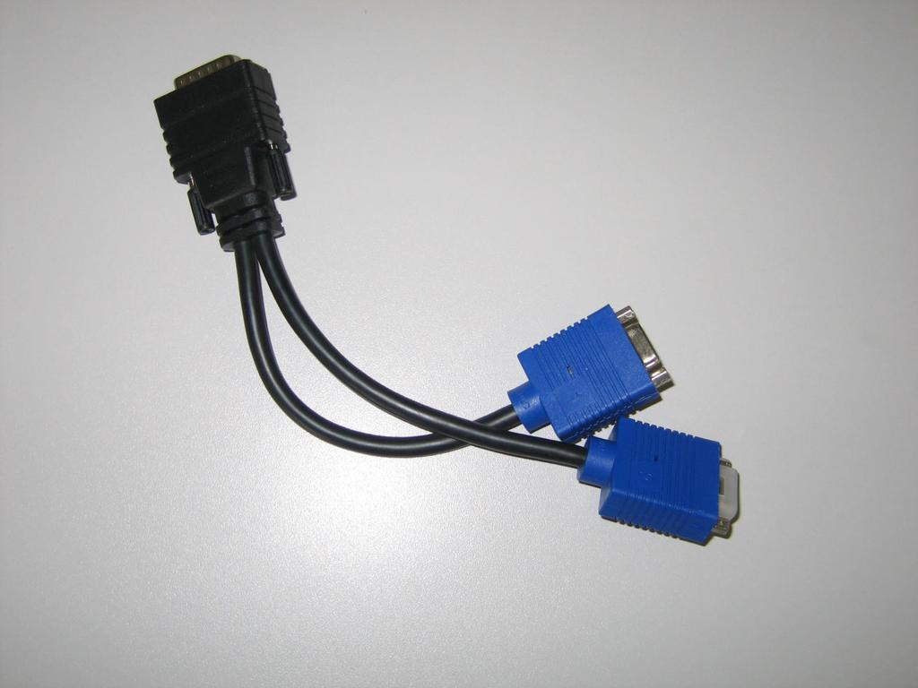 This is achieved by using the following cable This cable plugs into the graphics card output and provides 2-off VGA outputs.