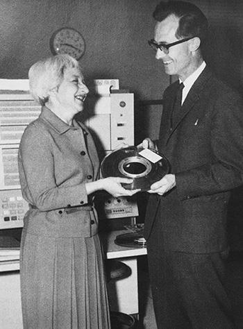 Henriette Avram presents a magnetic tape containing 9,300