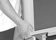 Remove the (4) four side screws that hold the back cover to the cabinet, see