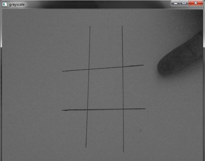 22 and manipulated by the tic-tac-toe program. In fact this image manipulation technique is used to create the idea of the user playing against an artificial intelligence unit.