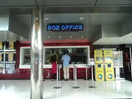 BOX OFFICE A place at a theater where tickets are bought or reserved Used to refer to the