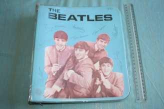 Blue 3-ring binder with Beatles on front cover with autographs.