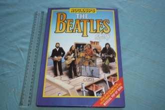 pad with photo of Beatles with signature on