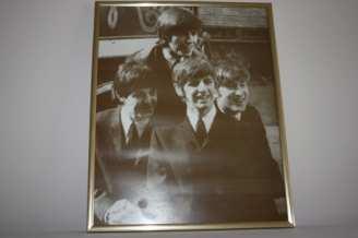 Early Beatles photograph with names printed beside each