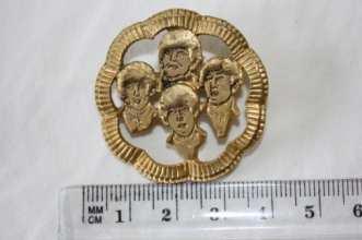 $125 #296 Beatles brass pendant with