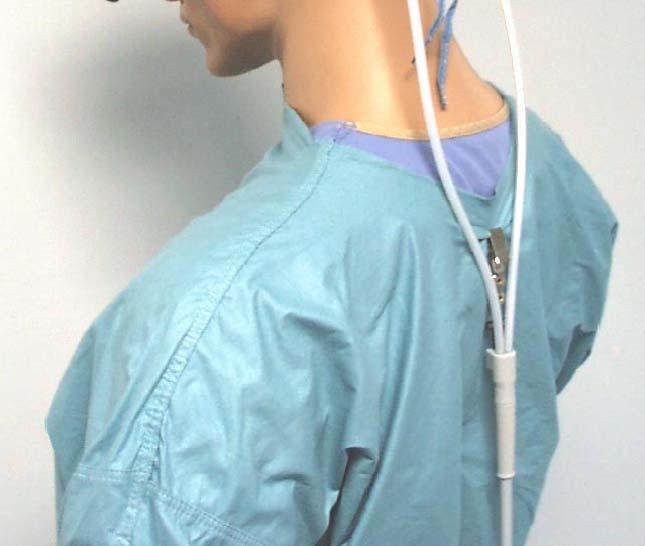 Adjust headlight module position using the joystick (autoclavable) (see Headlamp Adjustment, page 7). 4. Secure fiber optic cable to the user s surgical gown using the gown clip(s) provided.