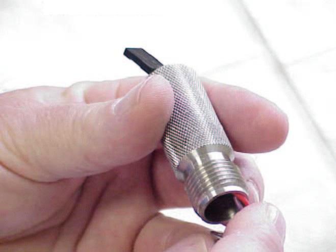 Dionex ED50A Electrochemical Detector 4. Pull the J2 connector through the opening in the electrode cylinder (see Figure B-10). J2 Connector Figure B-10. Installing the Electrode Cylinder 5.