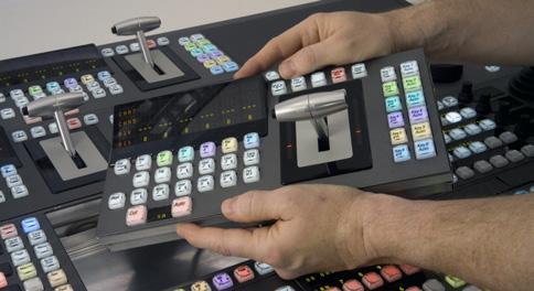 All buttons are illuminated with a selection of RGB colors, which dynamically change to indicate context (M/E colors, key colors, source colors and function colors).