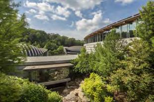 square. A short walk brings you to the renowned Crystal Bridges Museum of American Art where you ll receive a private tour and two tickets for their special exhibition. Expires May 20, 2017.